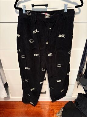 Black Corduroy Pants with White 'Okay' Print Urban Outfitters